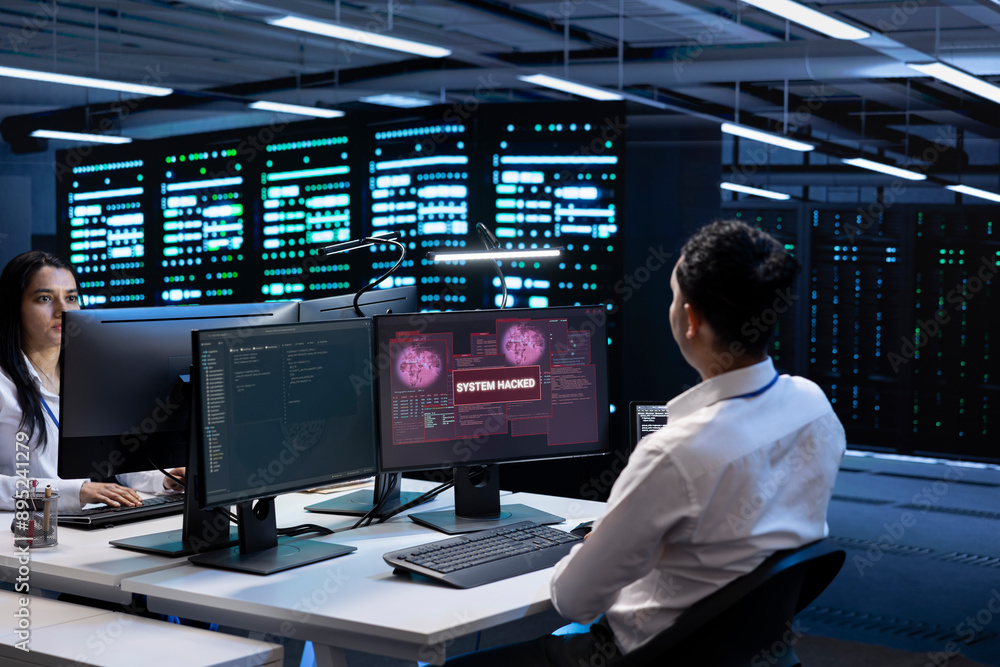 Poster teamworking developers in server room trying to protect hardware from cybercriminal attack. data cen