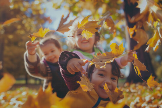 Realistic funny photo of latin american kids playing with  fallen leaves in the autumn park