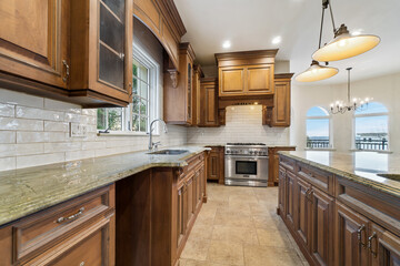 Images of Kitchen with cabinets island appliances cooking and baking