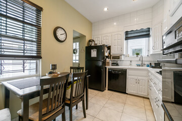 Images of Kitchen with cabinets island appliances cooking and baking