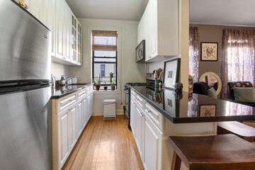 Images of Kitchen with cabinets island appliances cooking and baking