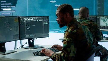 IT expert monitors AI brain intelligence system to collect crucial real time data for a new defense...