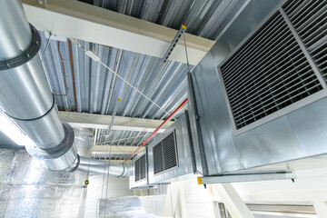 Obraz premium Industrial sheet steel zinc air duct, air conditioning equipment, Aluminum pipe insulation.
