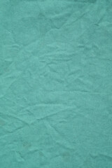 Green cotton fabric texture background, Wrinkle surface textile, wallpaper, banner, vertical