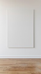 Big blank white poster on a clean, empty room floor.