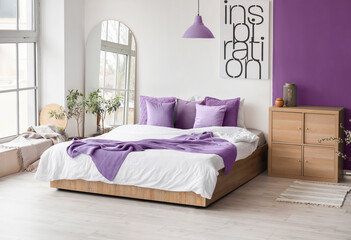 Modern interior of light bedroom with mirror