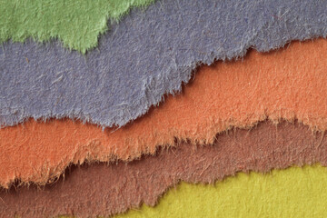 Macro ripped colored paper layered