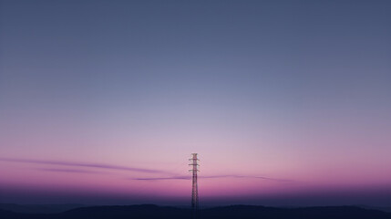 A dreamy photo of a twilight sky with a distant tower in the distance