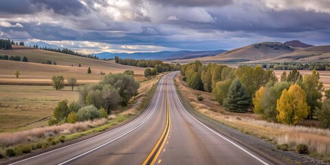 Fototapeta premium Beautiful highway cutting through scenic natural landscape, highway, nature, landscape, road, travel, mountains