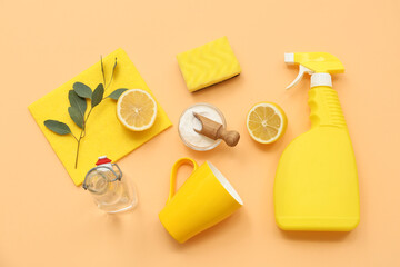 Composition with natural cleaning supplies and cup on color background