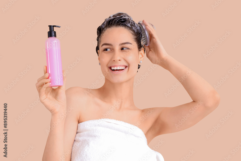 Sticker beautiful young happy woman with bottle of shampoo and brush washing hair on beige background