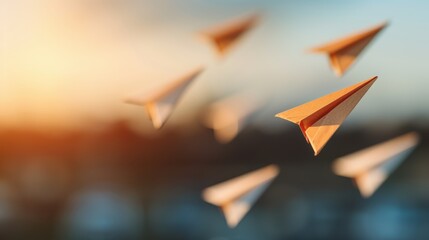 Paper planes are soaring through the golden sky at sunset, embodying a sense of aspiration and idealism. The glowing sky beautifully captures the spirit of dreams.