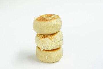 Bakpia is a food and souvenir typical of Yogyakarta made from a mixture of red beans or mung beans or cheese or yam coated with flour. That is an acculturation of Chinese culture. Isolated on white.