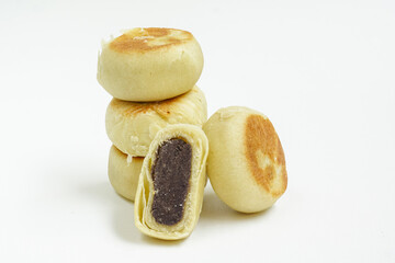 Bakpia, Bakpia Pathok kumbu hitam is a food and souvenir typical of Yogyakarta made from a mixture of red beans coated with flour. Isolated on white