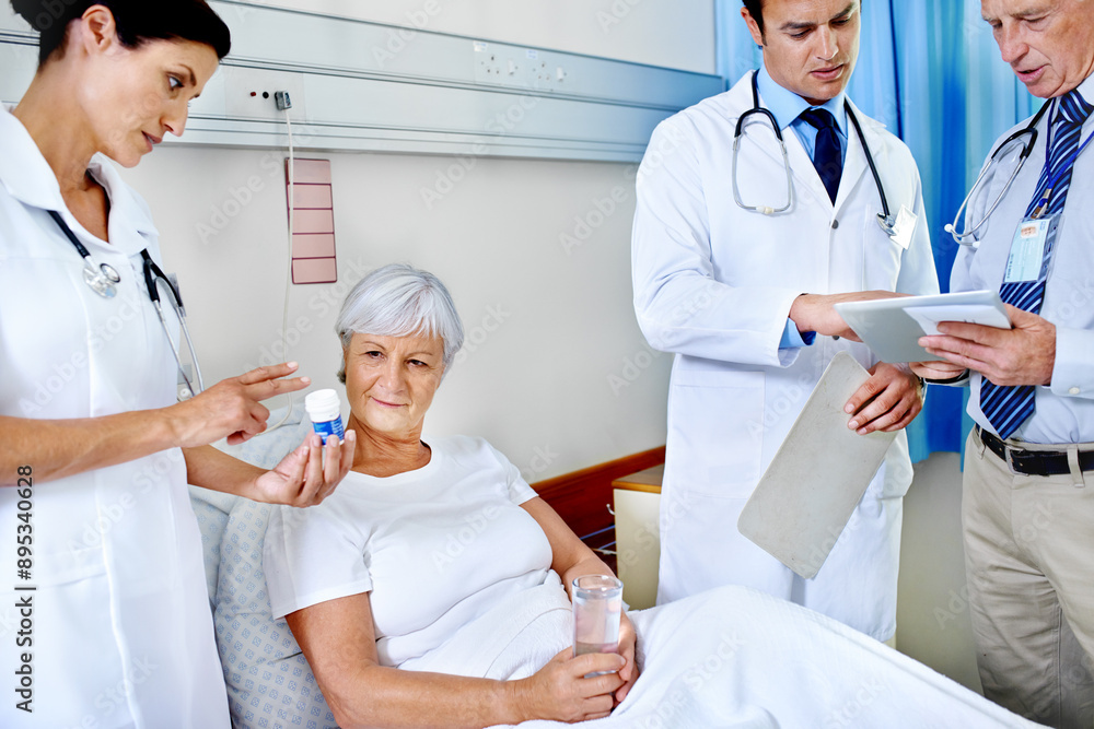 Wall mural Hospital, pills and nurse with old woman, smile and communication for health of patient and medical. Clinic, wellness and doctors with senior person, water and medicine in appointment of healthcare