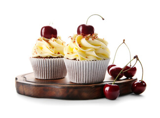 Wooden board with sweet cherry cupcakes and berries on white background
