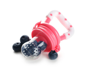 Baby nibbler with blueberry on white background