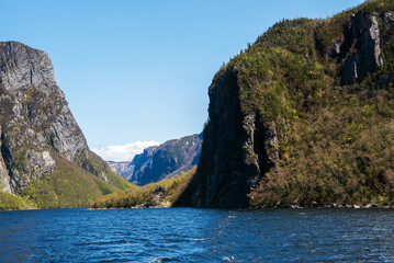 Departing from Western Brook Gorge, one last glance is cast over the precipitous rock cliffs, with Pissing Mare Falls lingering distantly in the backdrop.
