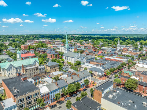 Aerial view Fredericksburg Virginia with Circuit Court building , historic business district, Baptist church, Chatham bridge over Rappahannock River