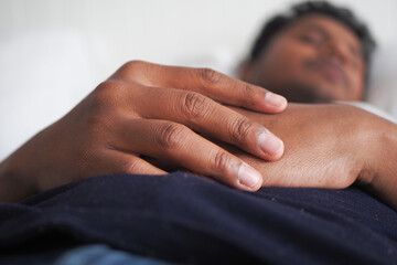  young men sleeping in bed, selective focus .