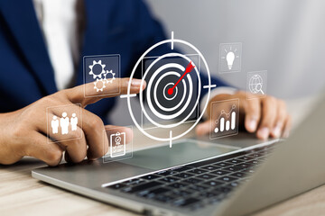 Concept of business strategy and future sustainable business finance action plan. Hand touch target...