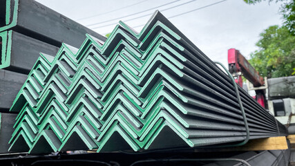 Equal Angles Steel angle iron Metal profile angle in packs at the warehouse of metal...