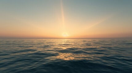 Obraz premium Sunset over calm ocean with clear sky and gentle waves.
