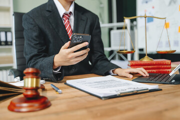 Justice and law concept.Male judge in a courtroom on white table and Counselor or Male lawyer working