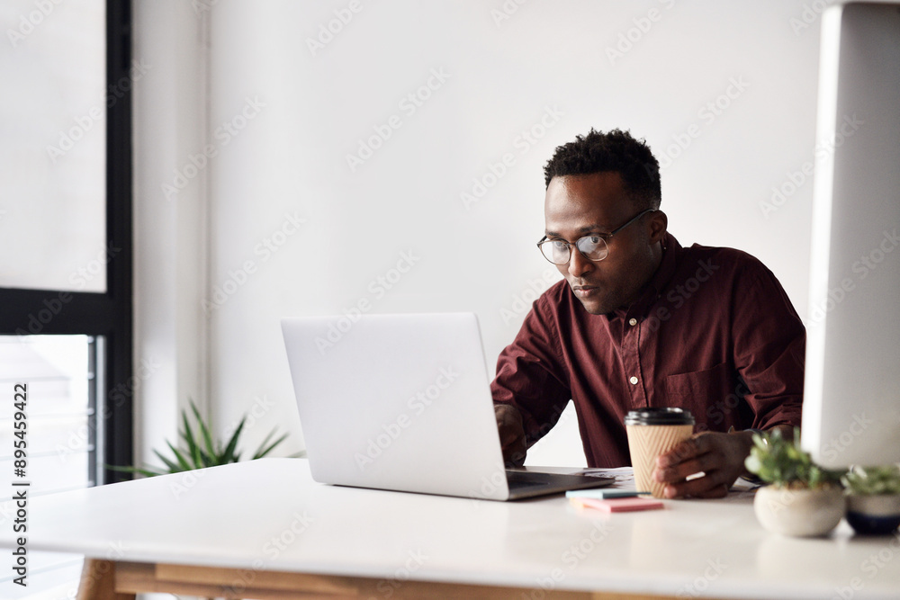 Poster Laptop, black man and reading in office for research, email and connection for networking. Business, technology and website developer in morning for career, project and idea or design for proposal