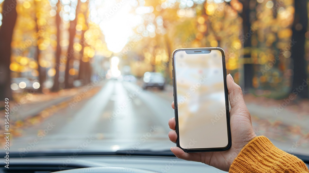 Aufkleber realistic pov shot of a hand holding a mobile phone with a blank white screen open to a ride-sharing