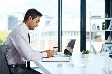 Desk, laptop and phone with business man in office for administration, communication or report....