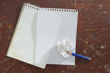 Notepad sheet and pencil