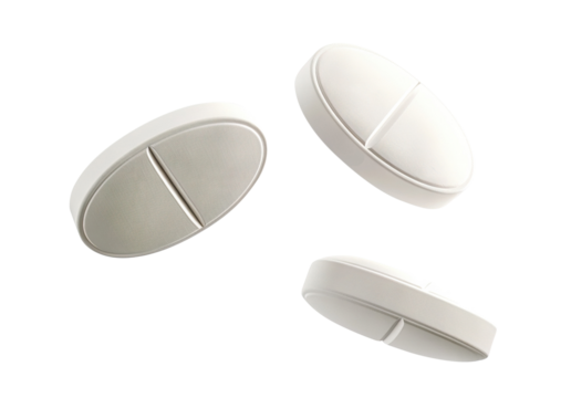 Three white pills floating in the air, cut out