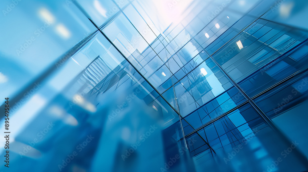 Poster blue glass windows in a modern building with a blurred background create an abstract effect.