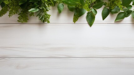 White wooden table top with spring green leafs