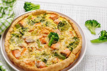 Homemade pie with salmon and broccoli