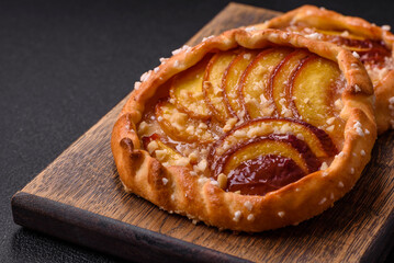 Delicious sweet crispy galettes with fruits and cinnamon