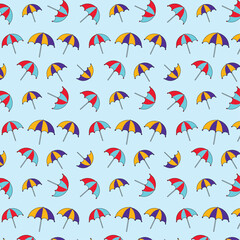 Seamless pattern design with colorful umbrellas isolated on light blue background.
