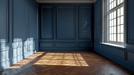 An empty room with dark blue walls and wooden floors and sunlight coming in from the window.