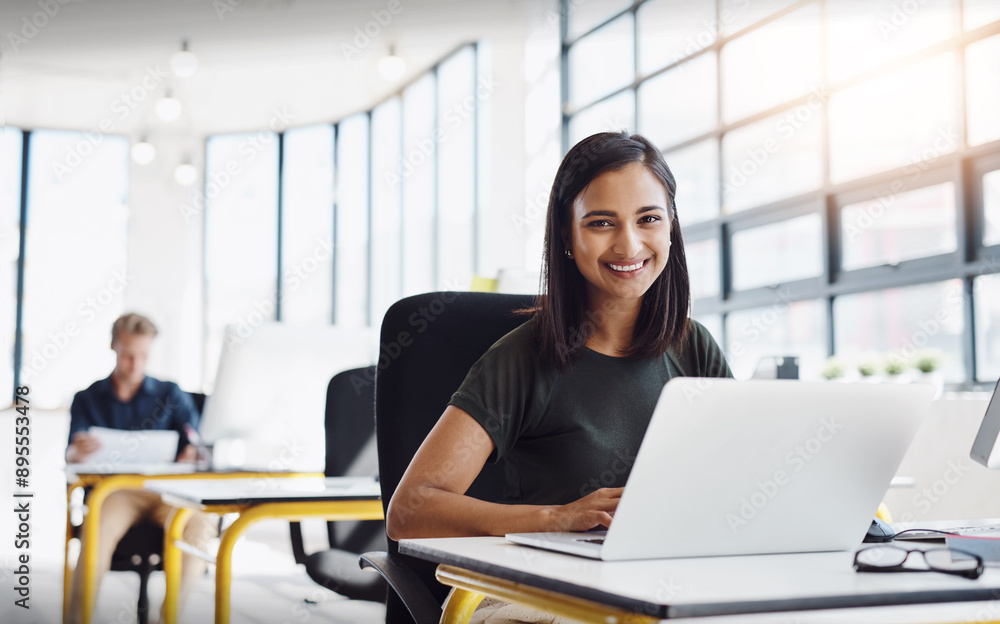 Poster Design, portrait and woman at laptop in digital agency with smile, confidence and office management. Happy, face and creative professional at desk for online project development in coworking space