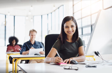 Obraz premium Smile, notes and portrait of woman at computer in digital agency for report, planning and ideas. Research, writing and creative professional at desk for online project development in coworking space