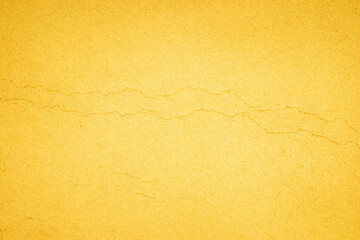 Yellow concrete stone texture for background in summer wallpaper. Cement and sand wall of tone...