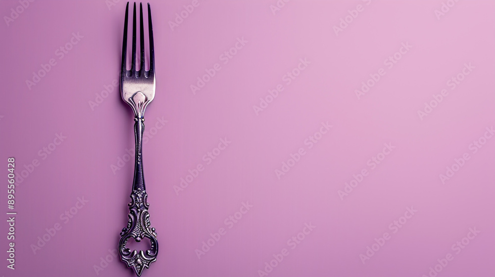 Poster a vintage silver fork with ornate patterns isolated on a soft lavender background with ample copy sp