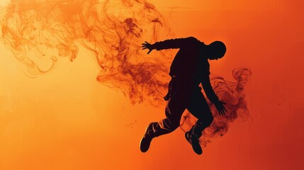 Silhouette of Man Jumping with Orange Smoke