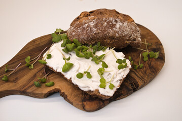 radish and mustard microgreens on a bread
