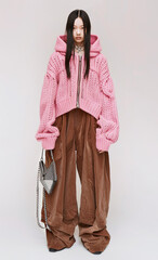 Fashion japan model in stylish street look and accessories bag.  y2k minimalist aesthetic.