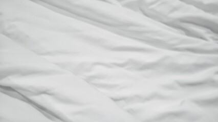 Abstract pattern of white crumpled bed sheet. White wrinkled fabric texture rippled surface. Close...