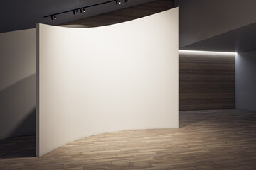 Contemporary concrete gallery interior with wooden parquet flooring, shaped wall and empty mock up place. 3D Rendering.