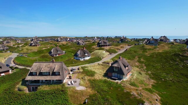 Island of Sylt - Hoernum - parallel aerial photograph of the beautiful thatched roof houses in the dune landscape
