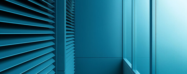 Obraz premium A serene blue interior featuring sleek lines and vertical blinds, perfect for modern design or minimalistic themes.